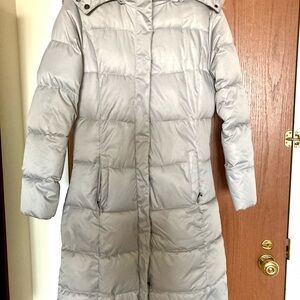 Silver coloured knee length Winter jacket with hood
